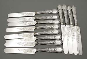 Twelve hand engraved antique coin silver breakfast knives by Tifft & Whiting